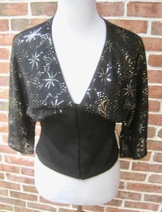 Chaqueta tejida negra St John Evening encogida de hombros lentejuelas plateadas gancho ojo frontal talla 8 - Imagen 1 de 10