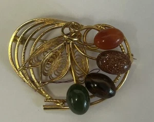 Vintage gorgeous brooch in gold tone with faux stones. 1.5 x 2 inches. - Picture 1 of 4