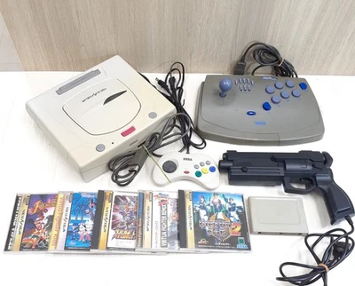 Sega Saturn white Console with Virtua Gun, Virtus Stick, 5 games & memory Japan - Image 1 of 4