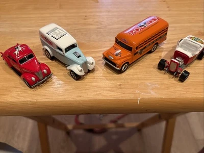 (4) Johnny Lightning Monopoly Chevy Bus Orange, Coupe, Panel Wagon, Convertible - Image 1 of 4
