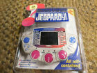 Tiger Electronics Jeopardy! Deluxe Edition Set With Catridges and Books 1&3