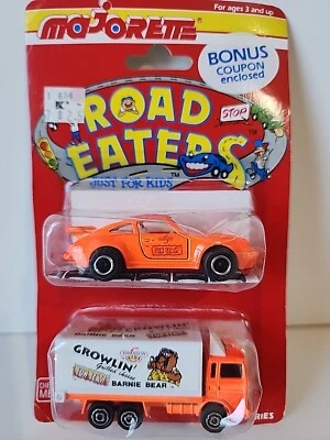 Camión Majorette Road Eaters naranja Porsche & Barnie Bear Swanson Foto 1 de 4