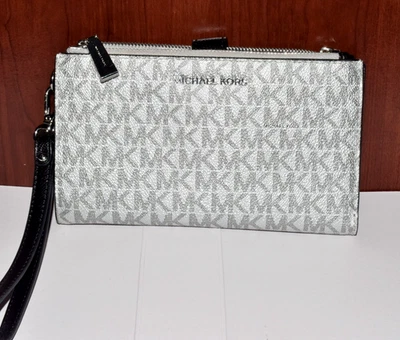 Michael Kors Logo Jet Set Viaje Doble Cremallera Teléfono Muñequera Billetera Plateada Negra En muy buena condición Foto 1 de 4