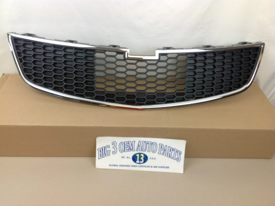2011-2014 Chevrolet Cruze para-choque dianteiro grade superior preta nova fabricante de equipamento original 95225614 - Imagem 1 de 3