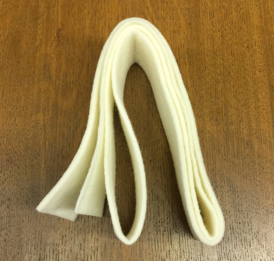 Silenciador de piano/riel de silencio fieltro/tela para montantes, 2" de ancho x 54", grosor cónico Foto 1 de 1