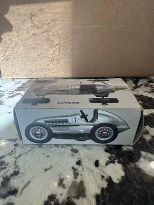 Antigua caja original Schuco Alemania Lufthansa #3 plateado cuerda coche de carreras con herramientas funciona Foto 1 de 4
