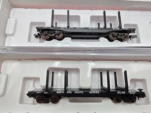 Atlas N Scale Northern Pacific 45' Logging Flat Car 2 Car Set - Diff #s - Picture 1 of 3