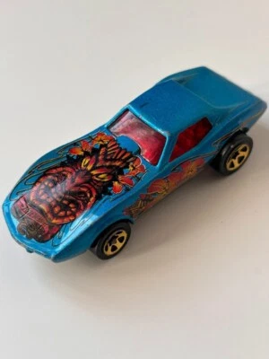 Macchinina HOT WHEELS Vintage 1975 Blue Tiki Corvette STINGRAY Toy Car MATTEL - Immagine 1 di 4