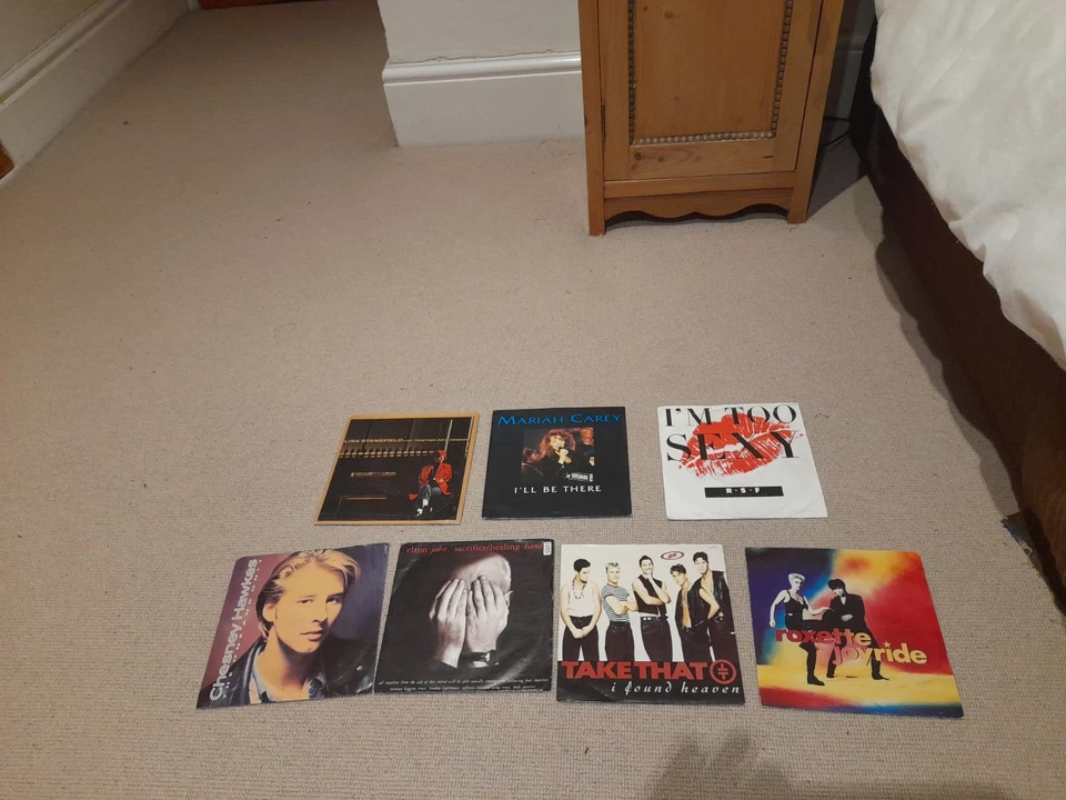 Collection of 7 1990s Pop 7" vinyl Records Take That Mariah Carey Roxette Elton - Image 1 of 1