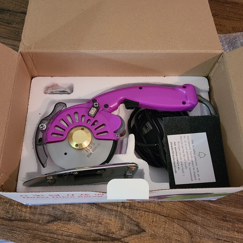 Cortador giratorio de tela eléctrico púrpura de alta resistencia Foto 1 de 4