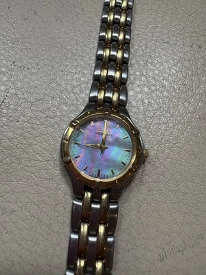 Reloj Citizen Eco-Drive WR100 Solar-Tech para dama plateado dorado madreperla 27 mm Foto 1 de 4