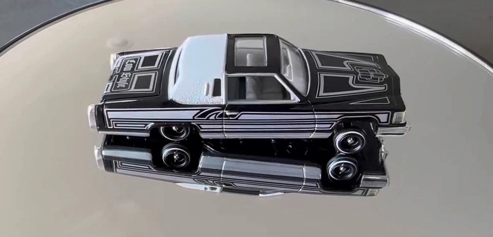 1:64 Custom 13x7 Dayton’s & 520 Sportway’ s  Revell 1981 Cadillac Lowrider #122  - Image 1 of 1