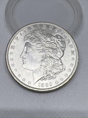 1889 Morgan Silver Dollar • Beautiful Uncirculated Condition • Few This Clean - Image 1 of 2