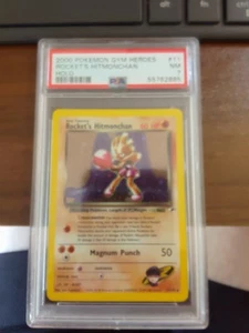 PSA 7 - 2000 Pokemon Gym Heroes Rocket's Hitmonchan #11 - Bild 1 von 1
