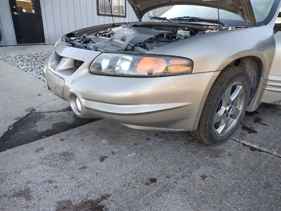 2000-2004 Pontiac Bonneville Front Bumper SLE Cover Fascia 54U Silver 2001 02 03 - Image 1 of 4