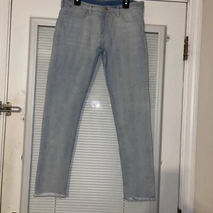 H&M GIRLS STRETCH BLUE 13-14Y ZIP JEANS LIGHT WASH RAW HEM 5-POCKET EUC - Picture 1 of 4