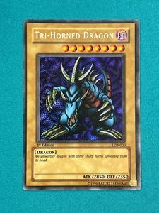 Yugioh Tri Horned Dragon 1st Edition LOB-000 Secret Rare LP WAVY HOLO - Picture 1 of 4