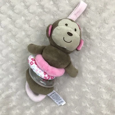 Carter's Monkey Plush Stuffed Animal Pull Toy Brown Pink Vibrates Rattle Flower Foto 1 de 4