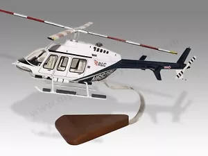 Bell 407 RLC Estado de Utah Transparente Cabina Escritorio Madera Helicóptero Modelo 1/32 - Imagen 1 de 13