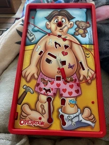 HASBRO ~Operation Game Board ONLY Buzzer works ~ Includes tweezers & Batteries) - Picture 1 of 1