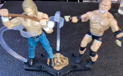 ACTION FIGURE Triple H vs Goldberg with Stand (NEAR MINT) Cover