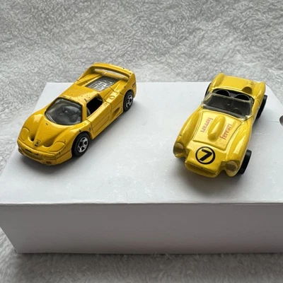Lote de dos Hot Wheels Ferrari 250/F50 amarillos sueltos Foto 1 de 4