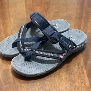 Skechers gepolsterte vegane Reggae Fest Riemchensandalen blau Damengröße 6 Mad Swag - Bild 1 von 8