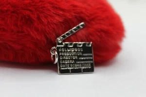 CIONDOLO ARGENTO HOLLYWOOD CIAK.......SI GIRA ARGENTO RODIATO MM 17X16 EXPLOIT - Picture 1 of 4