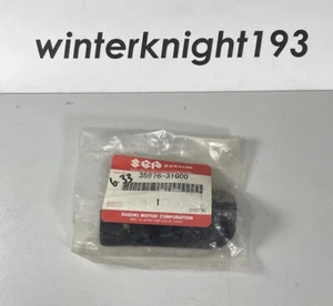 NOS OEM Suzuki 35976-31G00 BRACKET, REAR SIDE RR LH - Picture 1 of 3