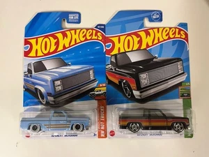 HOT WHEELS '83 CHEVY SILVERADO BLACK & BABY BLUE LOT OF 2 NEW - Picture 1 of 2