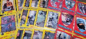 Juego completo de 88 tarjetas base Robo Cop 2 película + 11 pegatinas + fundas 1990 Topps - Imagen 1 de 2