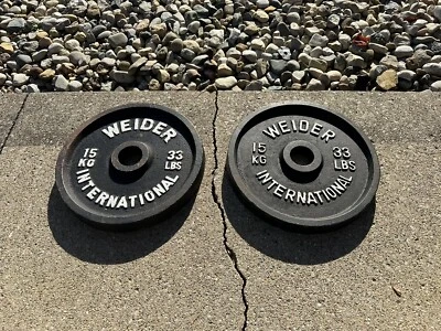 Juego de 2 platos olímpicos vintage Weider International 33 lb barra agujero de 2 pulgadas Foto 1 de 4