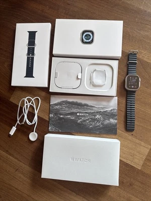 Apple Watch Ultra 49 мм GPS сотовый титановый корпус синий океанский ремешок MQET3LL/A 1-й - Изображение 1 из 4