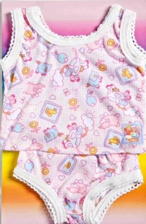 (€ 6,25/Set) Puppenkleidung: Garnitur 2 teilig, mit Tier-Druck, Puppengröße 45 - Bild 1 von 1