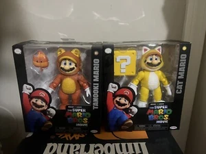 Neu Super Mario Bros Film Jakks 5 Zoll. Tanooki und Katze Mario Figuren in der Hand - Bild 1 von 1