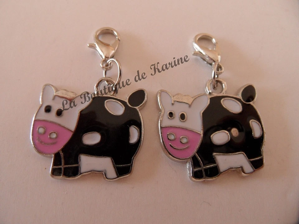 2 CHARMS BRELOQUE VACA METALLO ARGENTO A FERMOIR - BRACCIALE GIOIELLI PERLE - Immagine 1 di 1