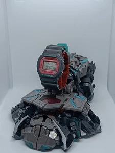 Casio G-Shock Transformers Nemesis Prime DW5600TF19-1JR Set Edición Limitada - Imagen 1 de 15
