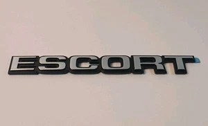 FORD ESCORT BADGE SYMBOL SIGN CHROME REAR TRUNK EMBLEM / NOS - Bild 1 von 7