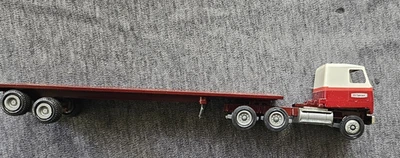Winross Maroon Trimax Flatbed Tractor Trailer 1:64 Scale - Image 1 of 4