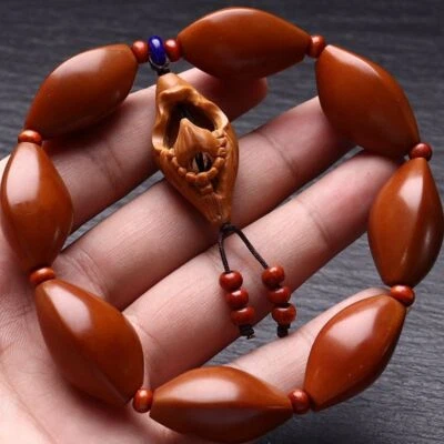 Colgante de cuentas de pozo de olivo núcleo de hierro tres bordes pulido talla de Buda individual Foto 1 de 4