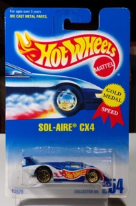 Hot Wheels Sol-Aire CX4 #254 GOLD WSP WHEELS ** BLUE CARD ** MOSC - Picture 1 of 2