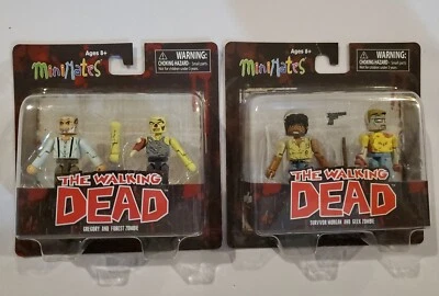 MiniMates The Walking Dead Gregory & Forest Zombie Morgan & Geek Zombie Paquete de 2  Foto 1 de 4