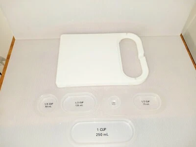 Pampered Chef Cut & Measure Cutting Board #1028 & 3 Measuring Cup Insert - Image 1 of 4