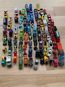 Lot of 100 diecast matchbox, hot wheels, tonka cars trucks helicopters, etc - Picture 1 of 2
