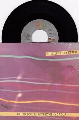 DAVID BOWIE / PAT METHENY GROUP THIS IS NOT AMERICA RECORD YUGOSLAVIA 7' PS  - Image 1 of 2