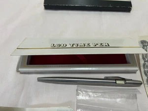 Nelsonic LCD Time Pen Quarzuhr silberfarben Hongkong nicht getestet - Bild 1 von 4