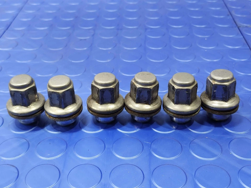 Tuercas de rueda de aleación Infiniti QX56 QX80 11-24 6 piezas originales OEM 402241LA3A Foto 1 de 2