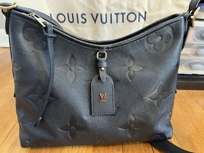 Louis Vuitton Empreinte Carry All -PM Foto 1 de 4