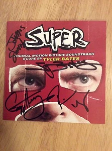SIGNED x8 Super Soundtrack CD James Gunn Tyler Bates Henry Rooker Tsar + Pics - Picture 1 of 6