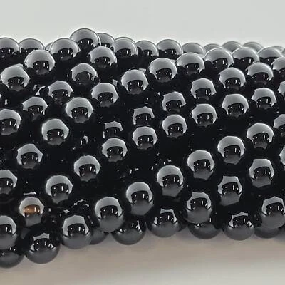 Cuentas de ónix negro piedras preciosas de cristal real cuentas redondas lisas naturales 6 mm 8 mm 10 mm Foto 1 de 4